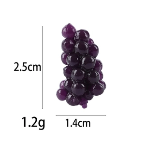 Miniature purple TPR grape stress toy, size 2.5x1.4cm, weight 1.2g on white background