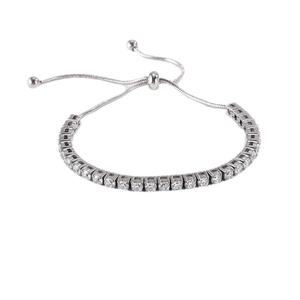 Silver adjustable tennis bracelet with micro-paved cubic zirconia stones on a white background