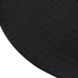 Close-up of high-density black fabric stitching on outdoor sun hat brim detail