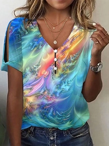 Detail of colorful tie-dye T-shirt with V-neck, white buttons and trendy shoulder cut-outs