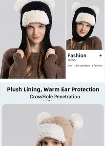 Detail of plush earflap hat with bear ears showing thick warm lining and soft faux fur