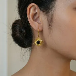 Bohemian 18K gold plated stainless steel sunburst earrings with black natural stone