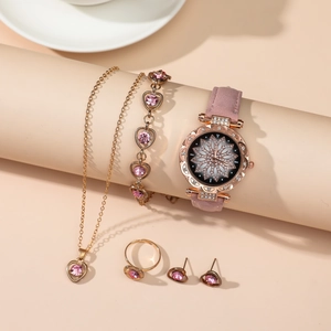 Elegant 5-piece jewelry set with pink heart stones and a matching watch on beige decor