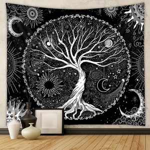 Detailed close-up of bohemian tree of life tapestry with sun and moon pattern on wall