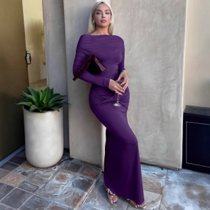 Detail showing the plum purple long sleeve slim dress with elegant waist ruching and drape