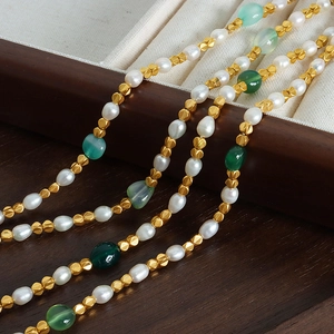 French style necklace with green agate drops, freshwater pearls, and golden beads