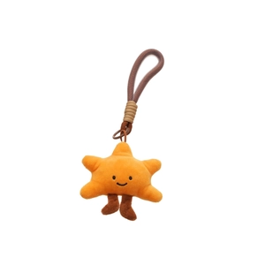 Cute star plush pendant in bright orange with embroidered smiley face and hanging cord