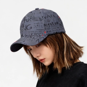 Graffiti printed baseball cap with red paint drips in street fashion style