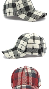 Detail of plaid baseball caps with six-panel crown and curved brim in various colors