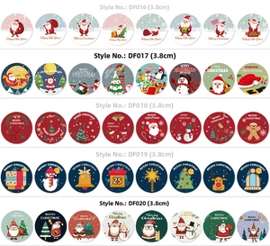 Detail showing 3.8cm circular Christmas stickers with Santa and reindeer designs