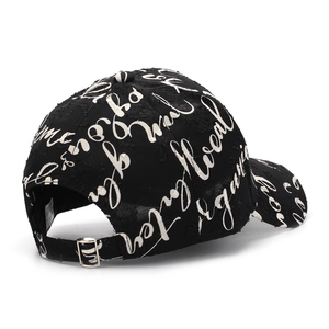 Distressed black baseball cap with white script embroidery and adjustable metal buckle
