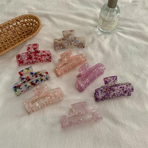Set of 8 minimalist medium acetate hair claws in marble and floral patterns for daily styling