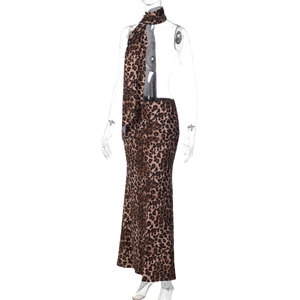 Detailed view of leopard print texture on slim-fit skirt and matching neck scarf