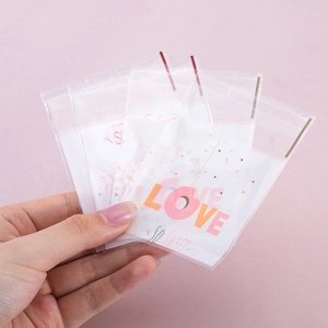Pink cartoon self-adhesive donut bags for cookies and candy packaging with Love print