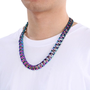Detail of 15mm rainbow gradient stainless steel Cuban chain necklace on a male model