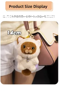 Plush cat keychain with heart ribbon hanging on a bag, 14cm cute stuffed kitten charm