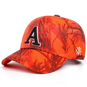Detail of orange tree camouflage baseball cap featuring 3D embroidered letter A logo