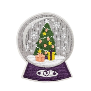 Embroidered Christmas patches with festive tree, gift box and snowflake motifs