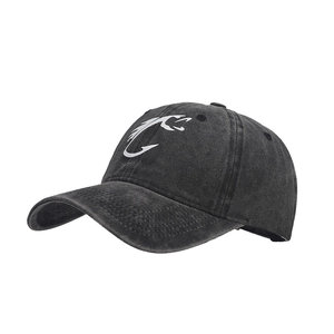 Washed distressed baseball cap with white fish hook graphic print for outdoor sun protection.
