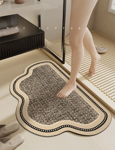 Detailed close-up of quick-dry absorbent diatomite bathroom mat with wave edges
