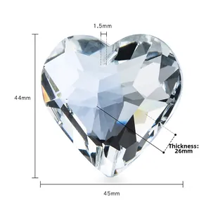 Macro detail of 44mm crystal heart prism showing 26mm thickness and precision facets