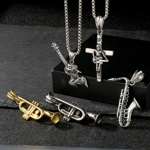 Detailed collection of rock music pendants featuring guitar skulls and saxophones