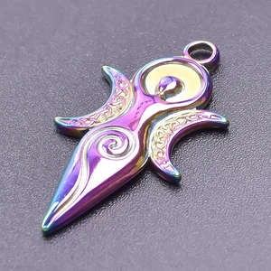 Macro shot of iridescent purple sun moon goddess pendant with intricate Celtic knots