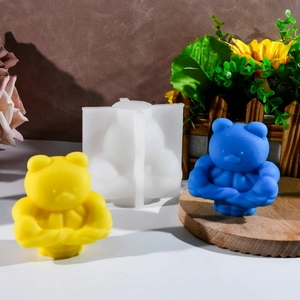 3D muscular bear silicone mold with yellow and blue resin bear samples for DIY crafts