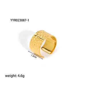 Detailed view of wide 18K gold plated hammered texture open ring with 1.2cm width and 4.6g weight
