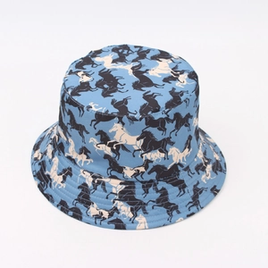 Reversible bucket hat with all-over horse print design in blue and white colors