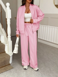 Women casual pink tracksuit set with zipper jacket and matching trousers for loungewear