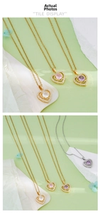 Macro view of heart-shaped zircon pendants with sparkling double-layered diamond settings