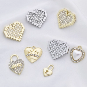 Assorted gold and silver heart charms with pearls and rhinestones for DIY earring making