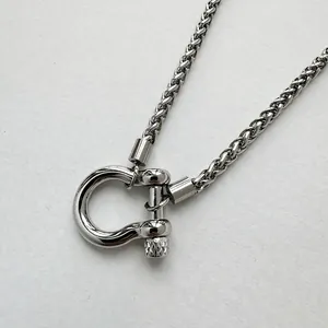Polished stainless steel keel chain necklace featuring industrial horseshoe shackle pendant