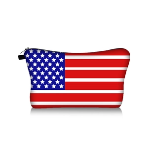 Close-up of portable makeup bag with American flag pattern and black zipper detail