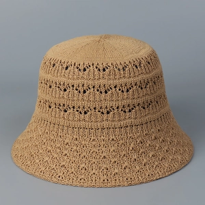 Detailed close-up showing the hollow-out knit pattern on this khaki bucket hat for women