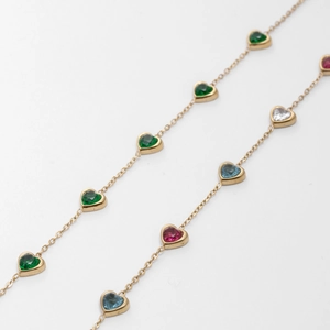 Elegant gold bracelet with heart-shaped colorful zircons and adjustable steel chain