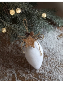 Close-up of white foam teardrop ornament with small pine cones and rustic twine bow