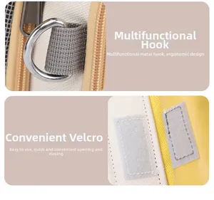 Detail view of durable canvas pet bag with metal D-ring and hook-and-loop fastener