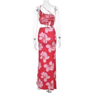 Back view of a red floral two-piece set with a single shoulder tie top and a long maxi skirt