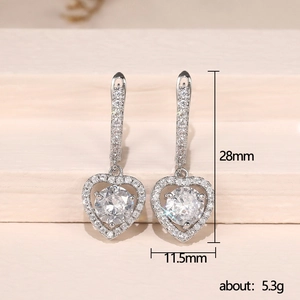Detailed view of silver heart earrings with zircon stones and 28mm height measurements