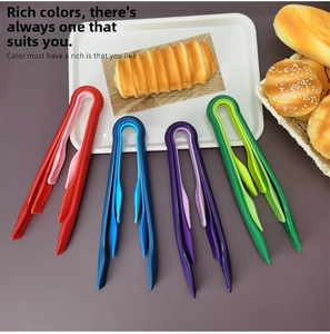 Set of four colorful plastic food tongs for bread and salad in red, blue, purple, and green