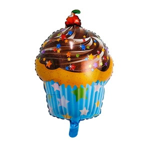 Detail of cupcake-shaped foil balloon with cherry, chocolate and star patterns