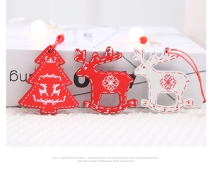 Three wooden Christmas ornaments featuring reindeer and tree shapes with hanging cords