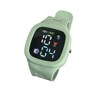 Kids LED sports watch in mint green with touch screen display and silicone wristband