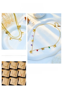 Detailed grid of butterfly and heart pendant necklaces with gold plating and gemstones
