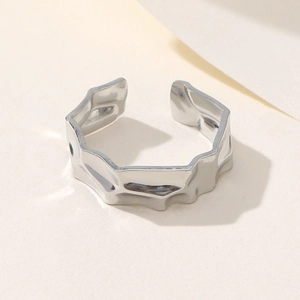 Irregular textured stainless steel open ring with silver finish and concave design