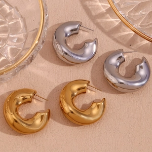 Polished gold and silver stainless steel C-shape hoop earrings in minimalist hollow design