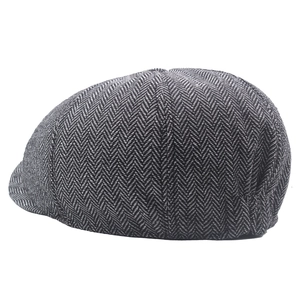 Classic herringbone newsboy hat with dark grey tweed texture and vintage flat cap design
