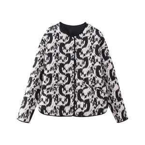 Women's quilted jacket featuring black and white abstract print and a collarless design